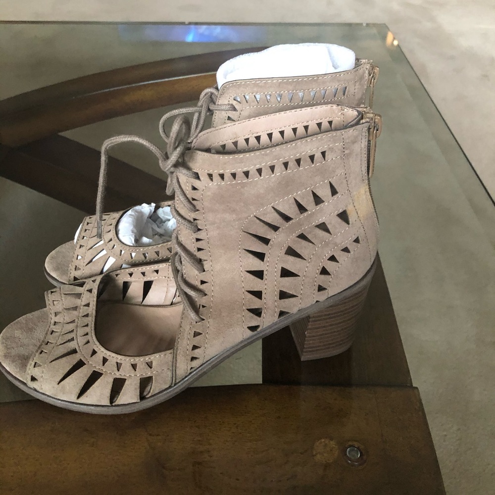 NWT- Lace up on trend sandals.